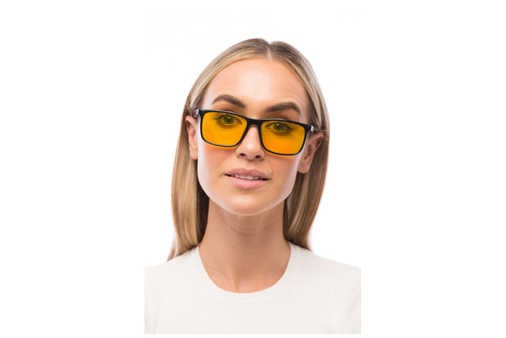 Woman Wearing Brooklyn Light Sensitivity Glasses Prescription