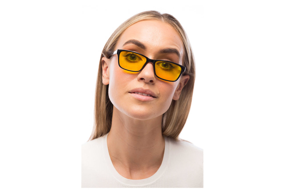 Woman Wearing Denver Light Sensitivity Glasses Prescription