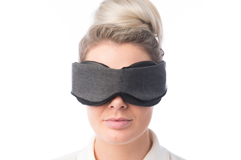 Woman Wearing Classic Blackout Sleep Mask Front View